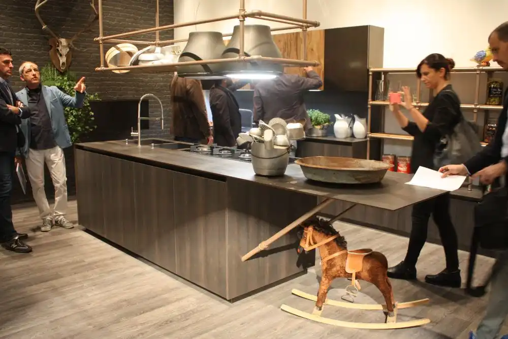 Kitchen with industrial pipes systems above countertop