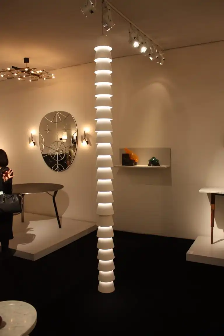 The long, slender fixture dominates the space without overwhelming.