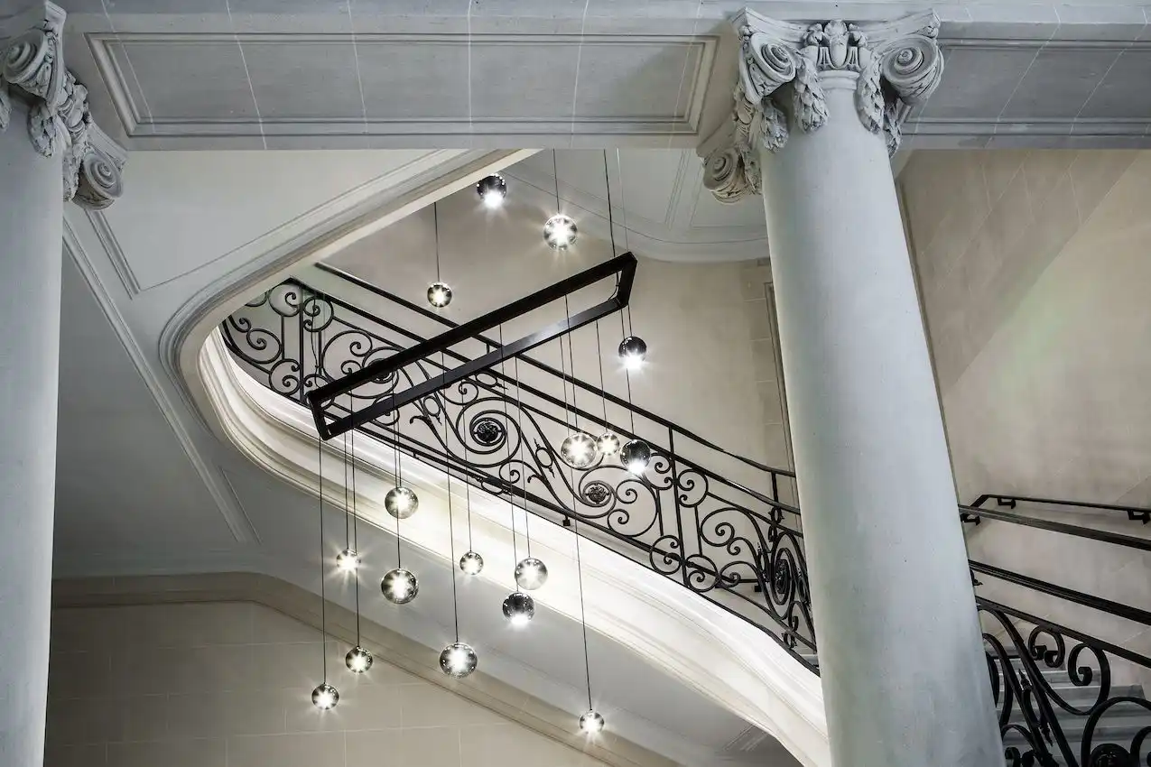 La Clef Cozy Paris Hotel stairs lighting fixtures