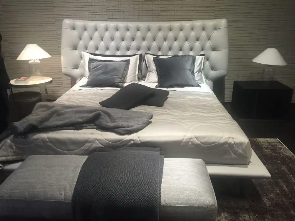 Large gray tufted bedroom headboard
