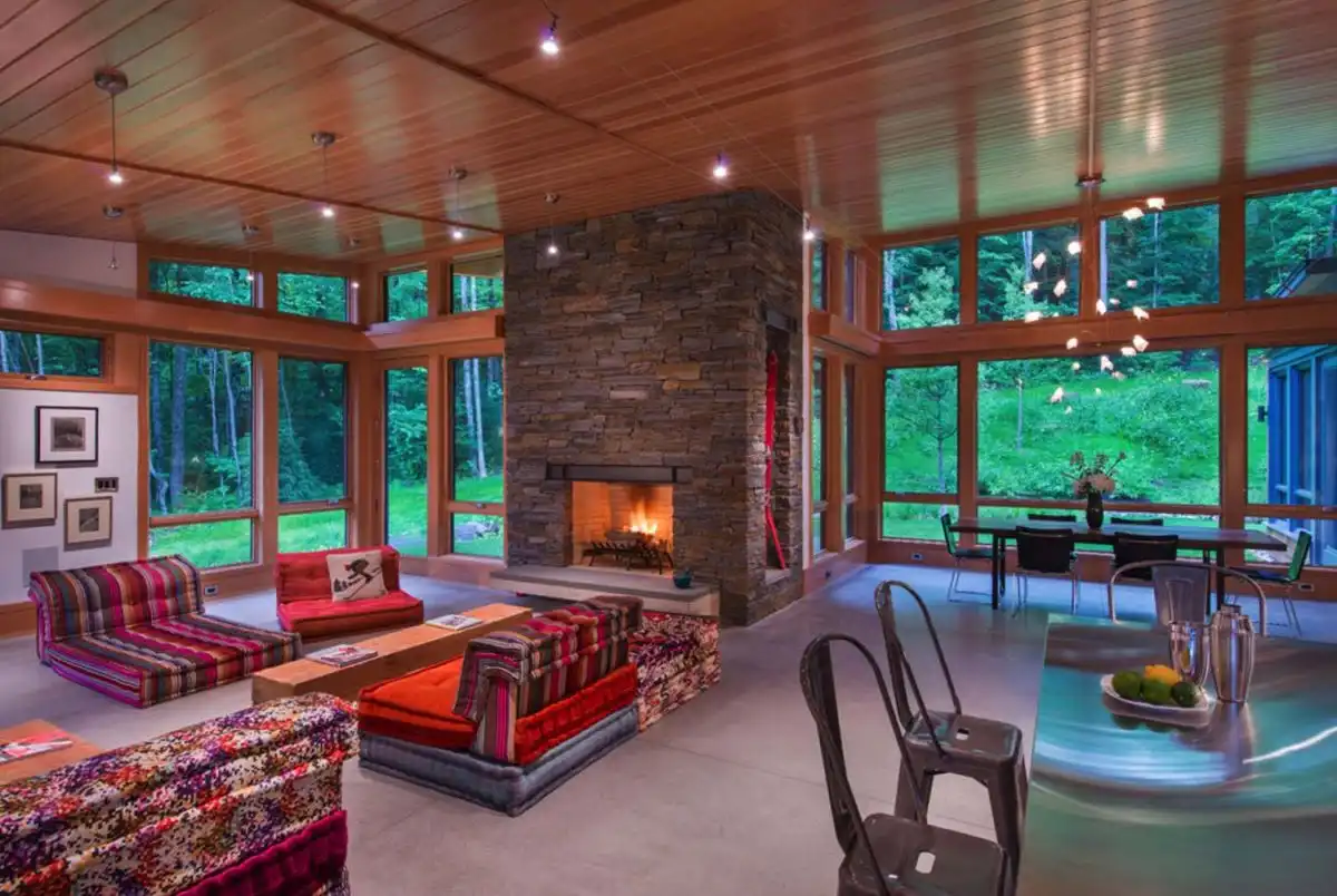 Large modular sofa and stone stacked fireplace