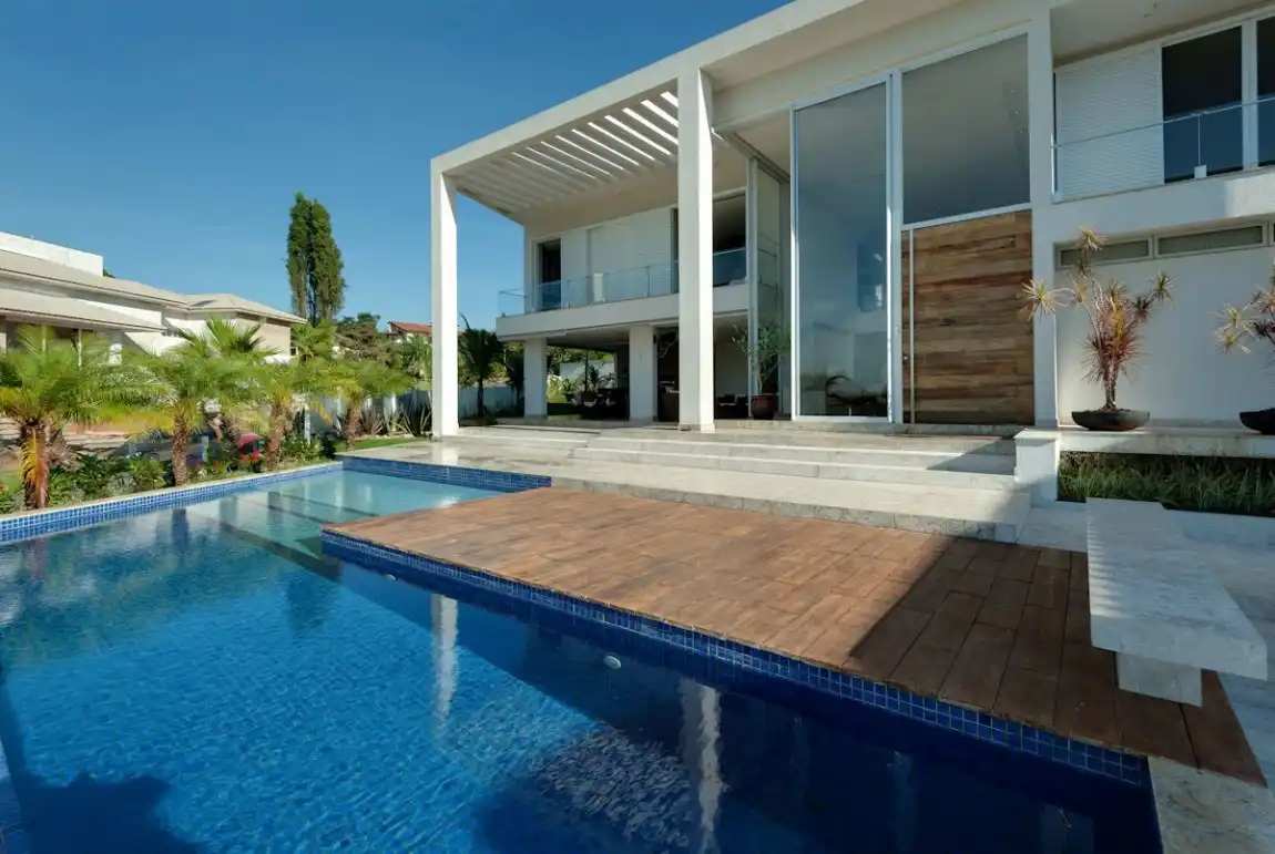 Large summer house with pergola roof design