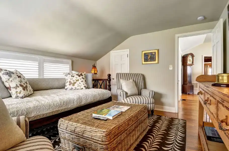 Large wicker basket used like ottoman or coffee table