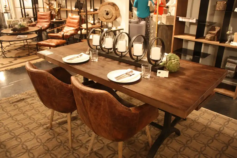Leather dining rable chairs and candle stick for centerpiece