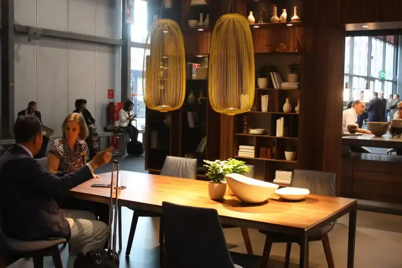 Light and airy, these long pendants in Team7's exhibit are perfect for a contemporary kitchen that otherwise has clean lines and lots of angles.