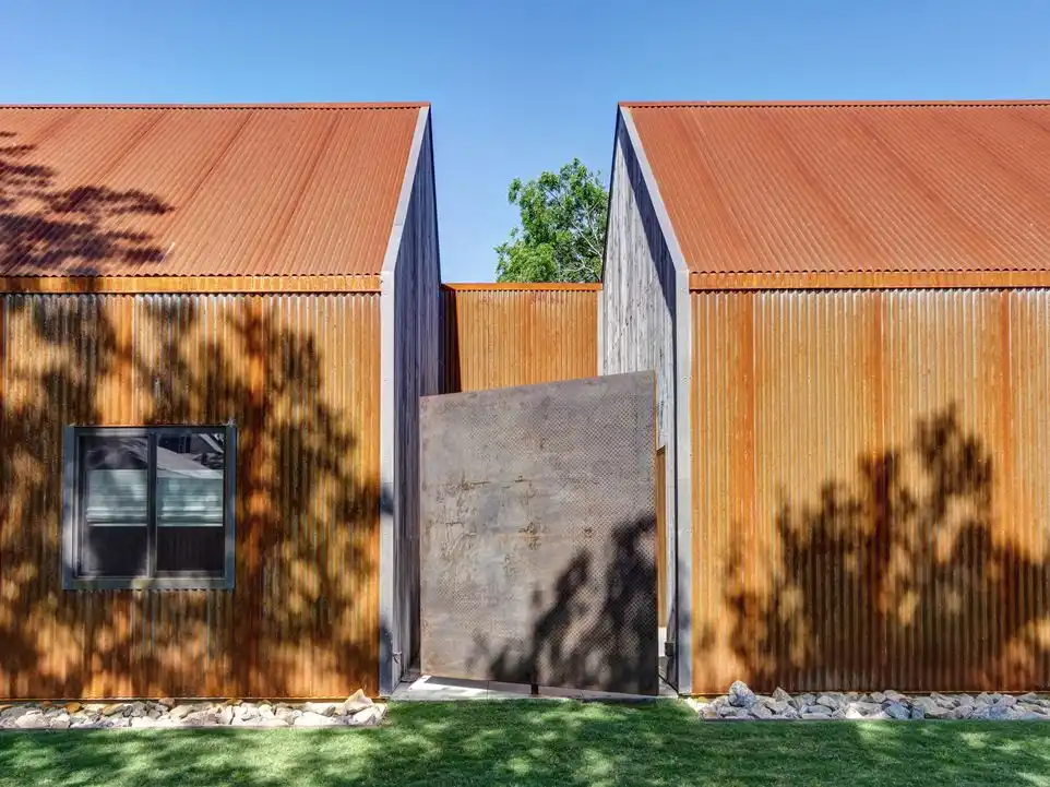 The rotating panel allows for privacy on the small patio, as well as yard access.
