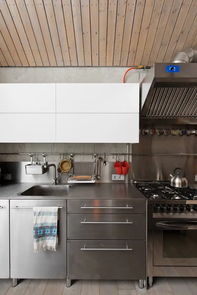 The stainless steel counters and cabinets are both hygienic and visually imposing