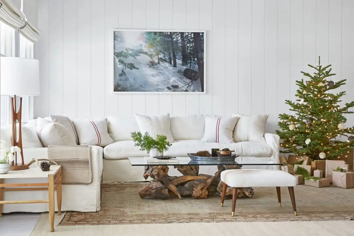 Live edge coffee table with glass top and simple Christmas Tree Decorated with string Lights