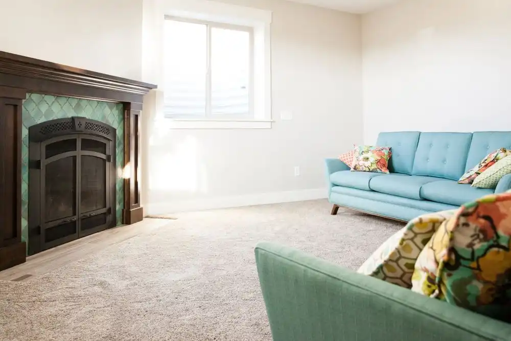 Living room fireplace with turquoise tiles