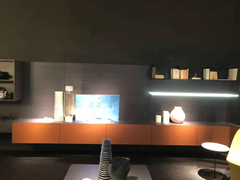 Living room media furniture with orange cabinets