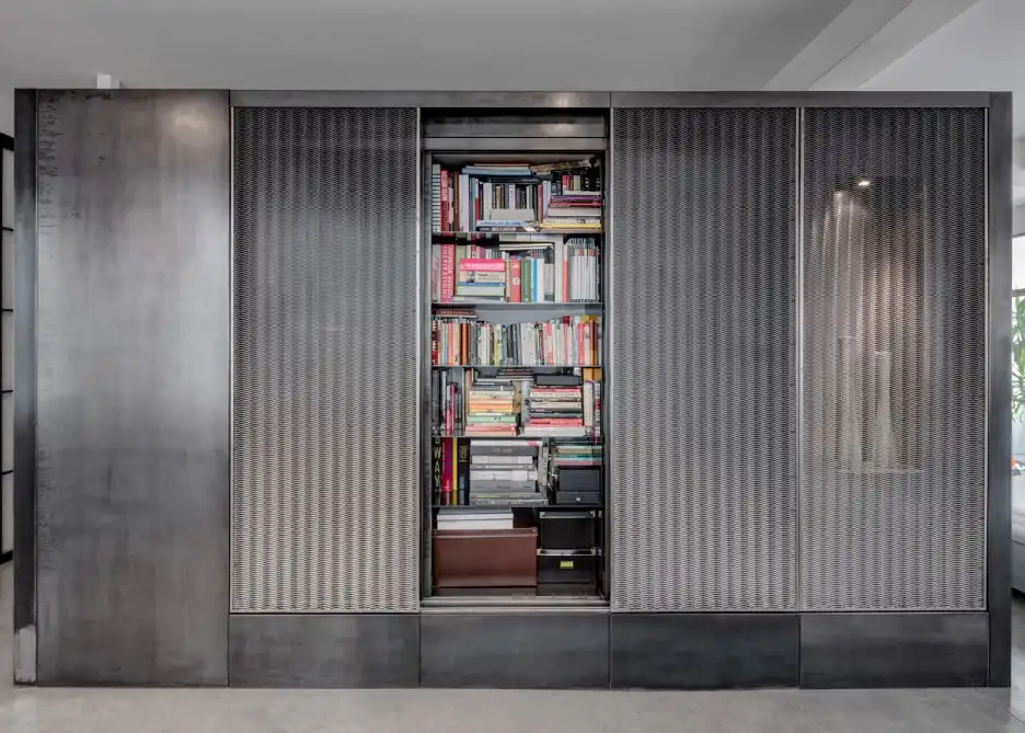 London warehouse space into an apartment bookshelf