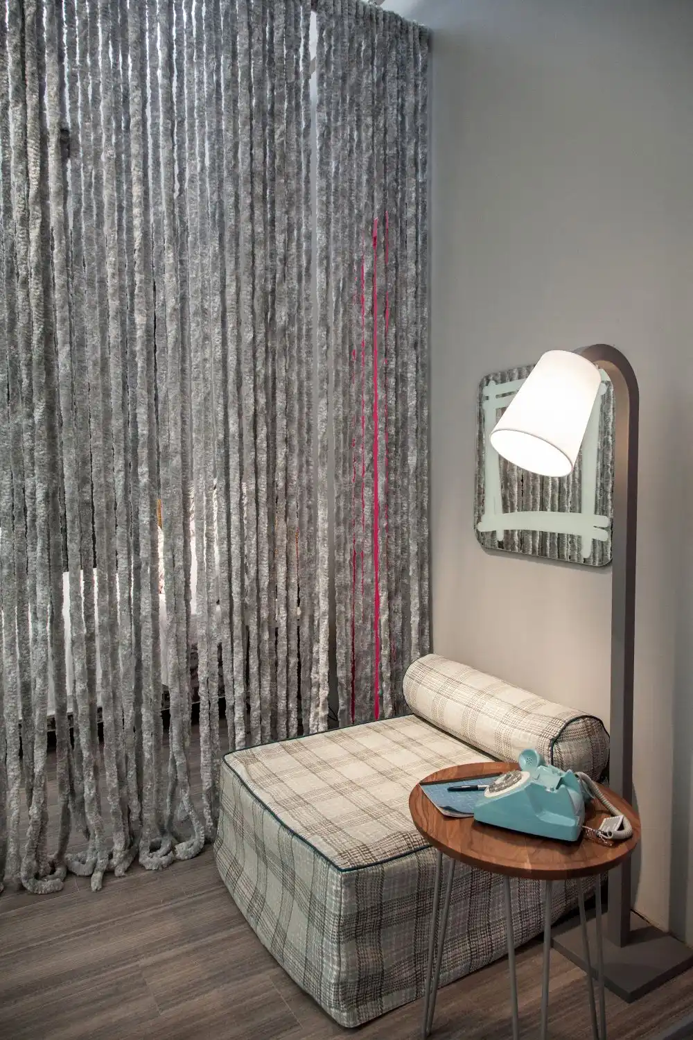 You can separate your reading nook from the rest of the room using curtains or a divider
