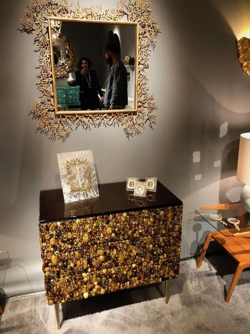 The cabinet is truly a jewel-encrusted work of art.