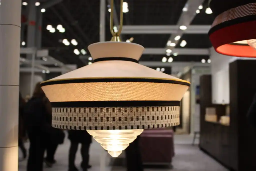The frosted glass also echoes the characteristics of an Art Deco light fixture.