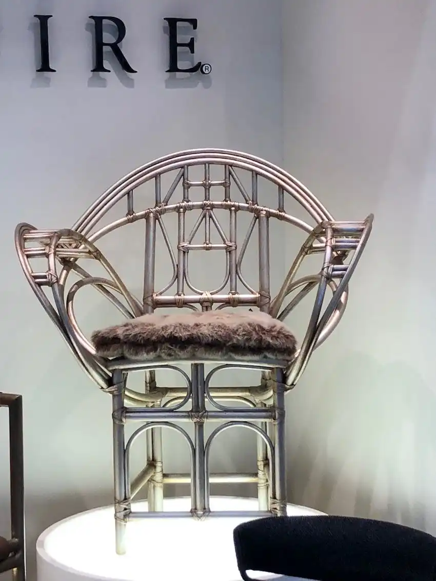 The design of this chair is lithe and regal, especially with its metallic finish.