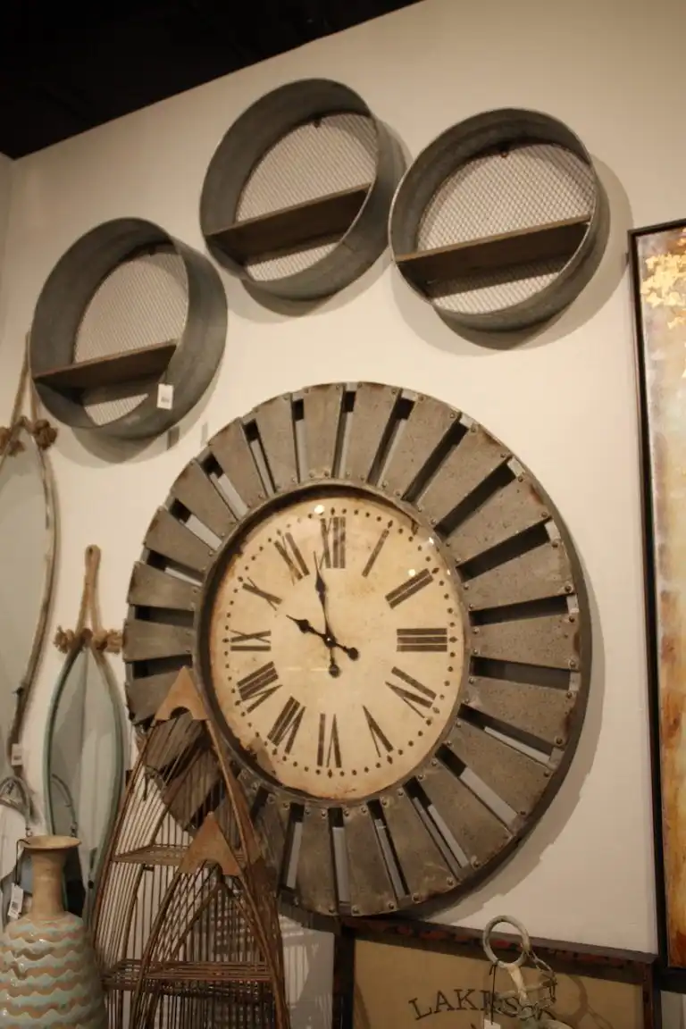 Grouping metal items that have a patina emphasizes the rustic or industrial tone of a space.