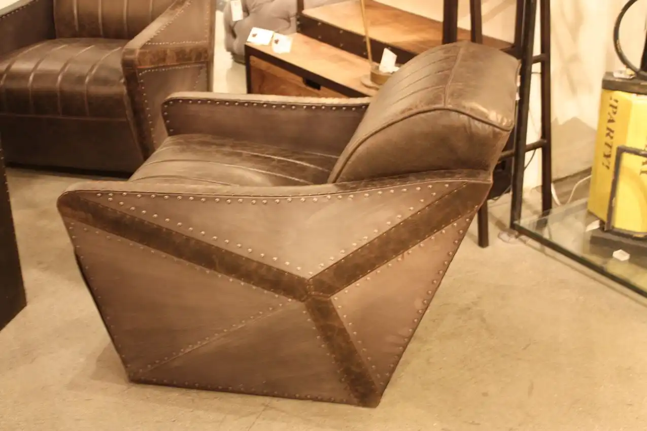 This cool chair combines metal and leather in an aeronautically inspired design.
