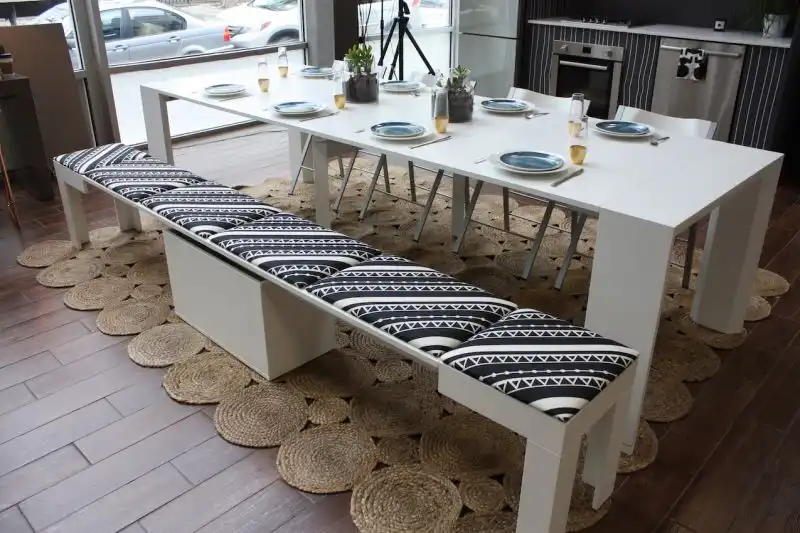 Can you believe that small console becomes this large dining table? whether you live in a small space or just need extra dining space for the occasional party, this is a fantastic design. The multiple expansion leaves store separately. The bench also collapses into a single unit, with all the cushions stored in the central box underneath. Oh, and by the way, the bench fits under the closed console table.
