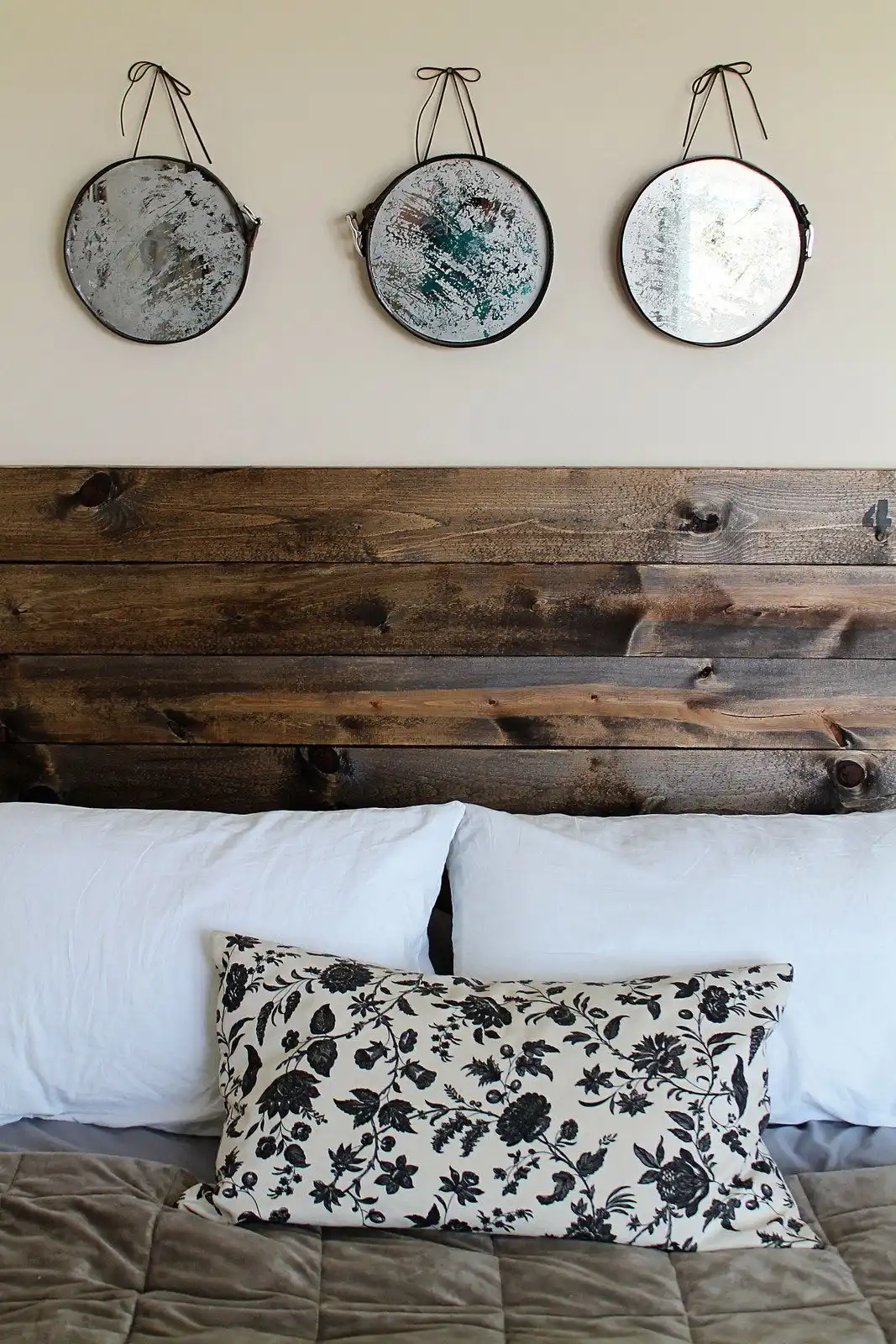 Frame mirrors with old leather belts