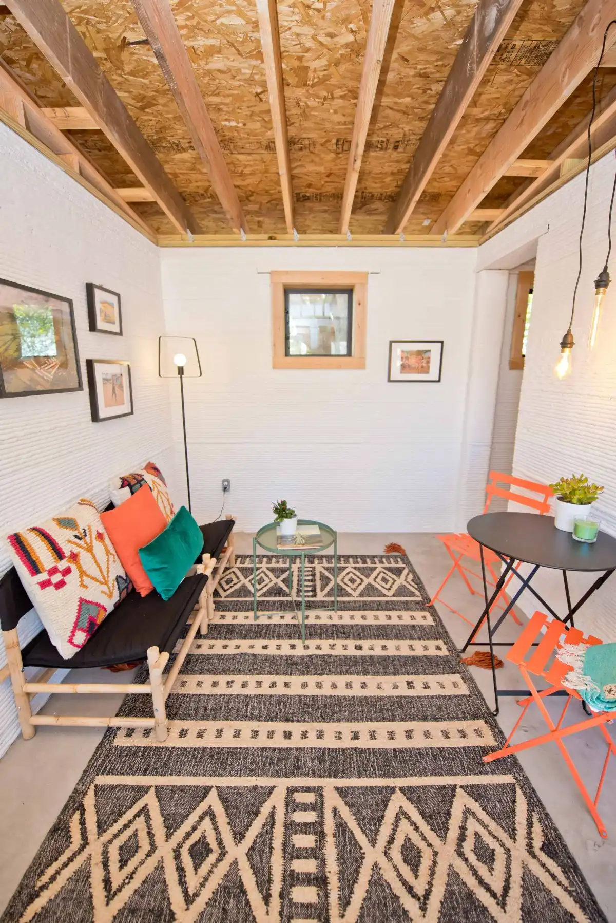 Modern 3D printed home by Icon - narrow living room