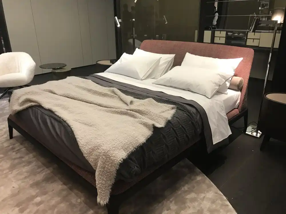 Warm accent colors can add a lot to an otherwise minimal-looking bedroom