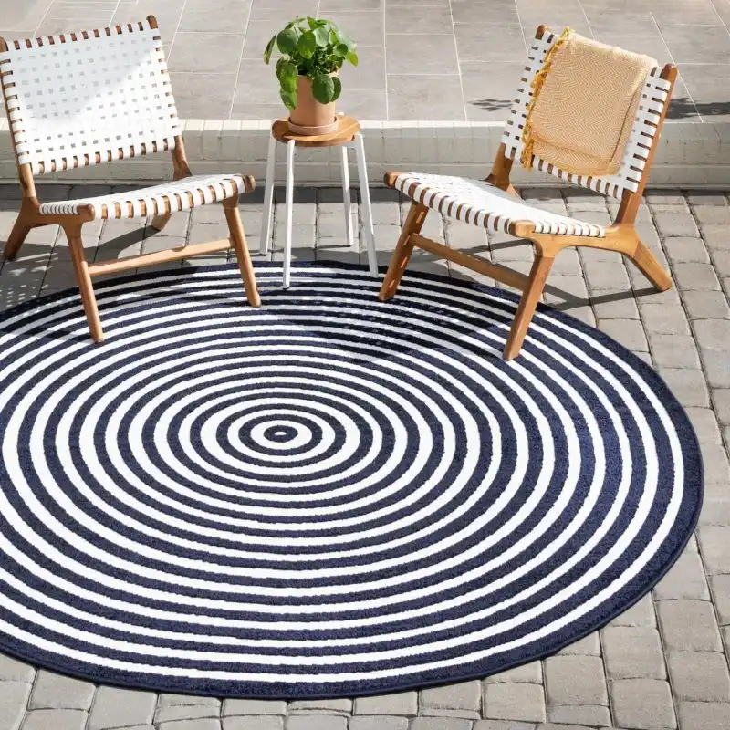 Modern black and white round outdoor rug