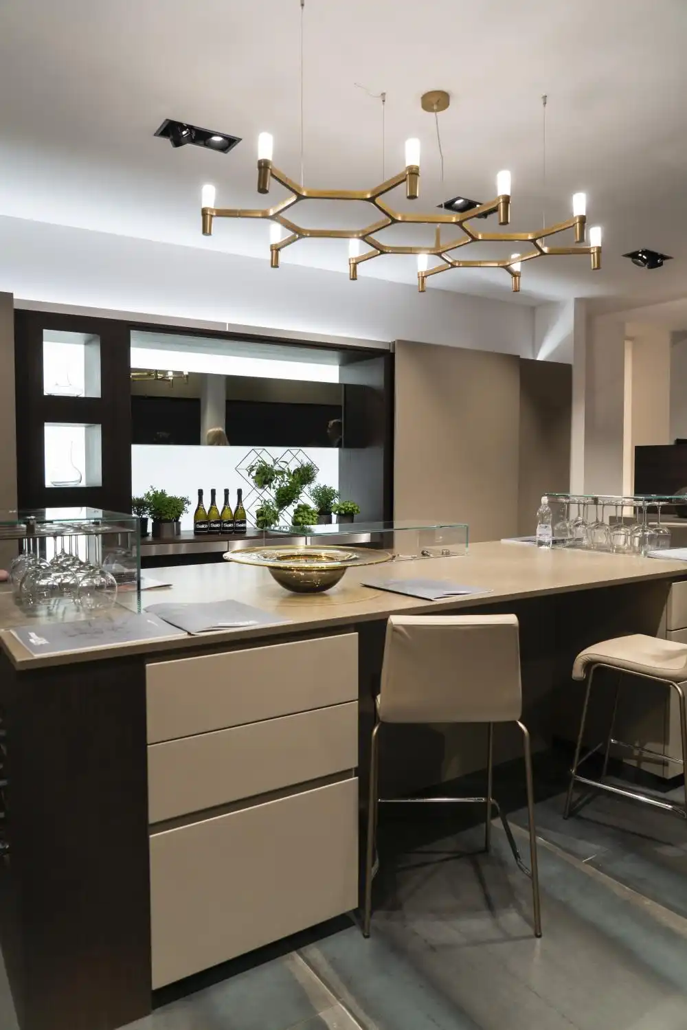 Modern kitchen decor with chandelier above island