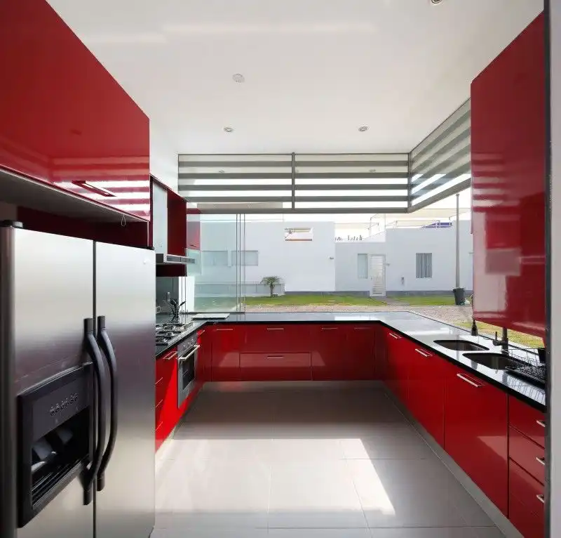 Modern minimalist red kitchen by Gomez de la Torre y Guerrero Arquitectos