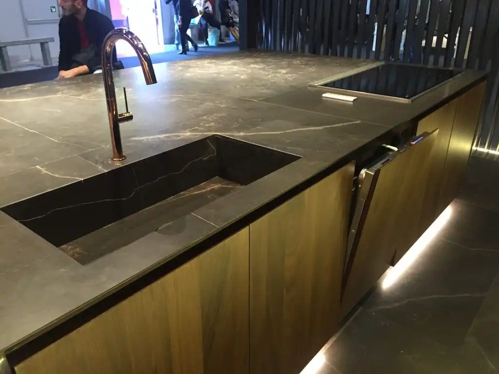Soapstone countertops can soften the feel of a minimalist design.