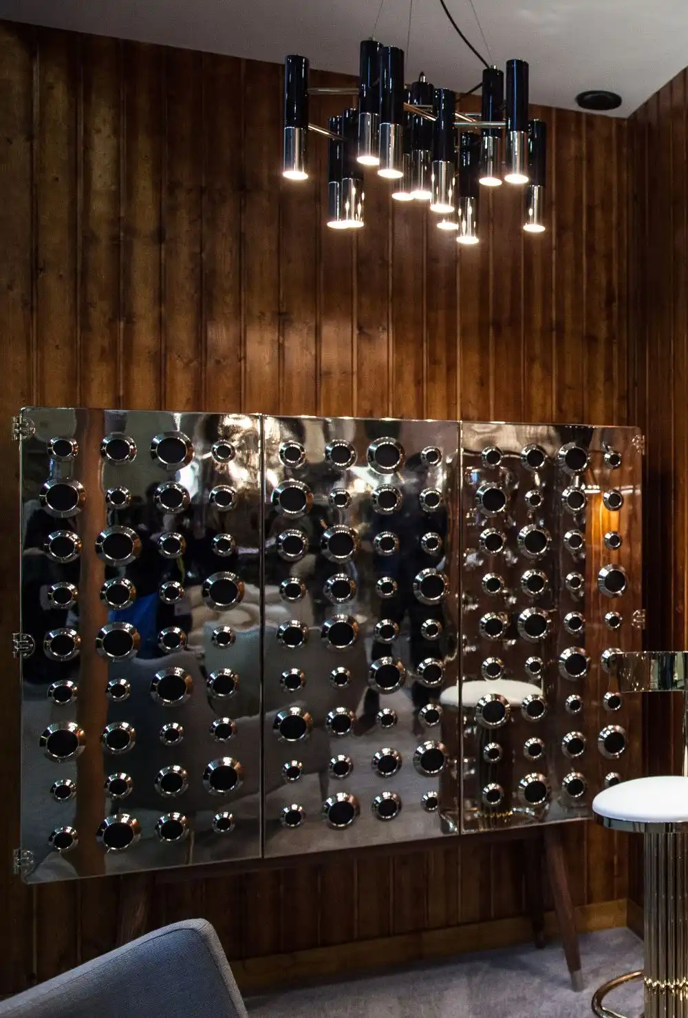 Bar cabinet with circular cutouts