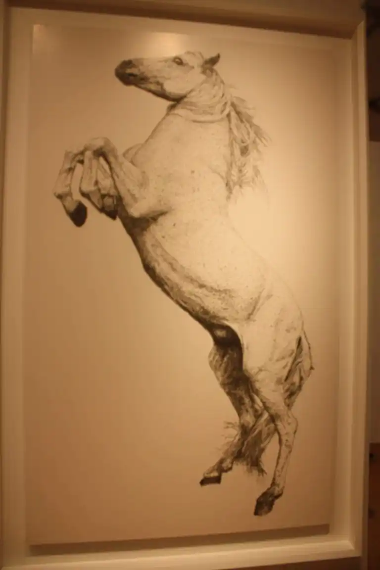 The details shading in the work are so precise it is difficult to believe it's composed of nails.