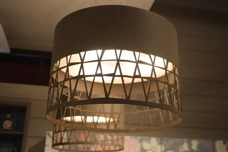 Here's a closer look at these neutral-colored kitchen island lights.