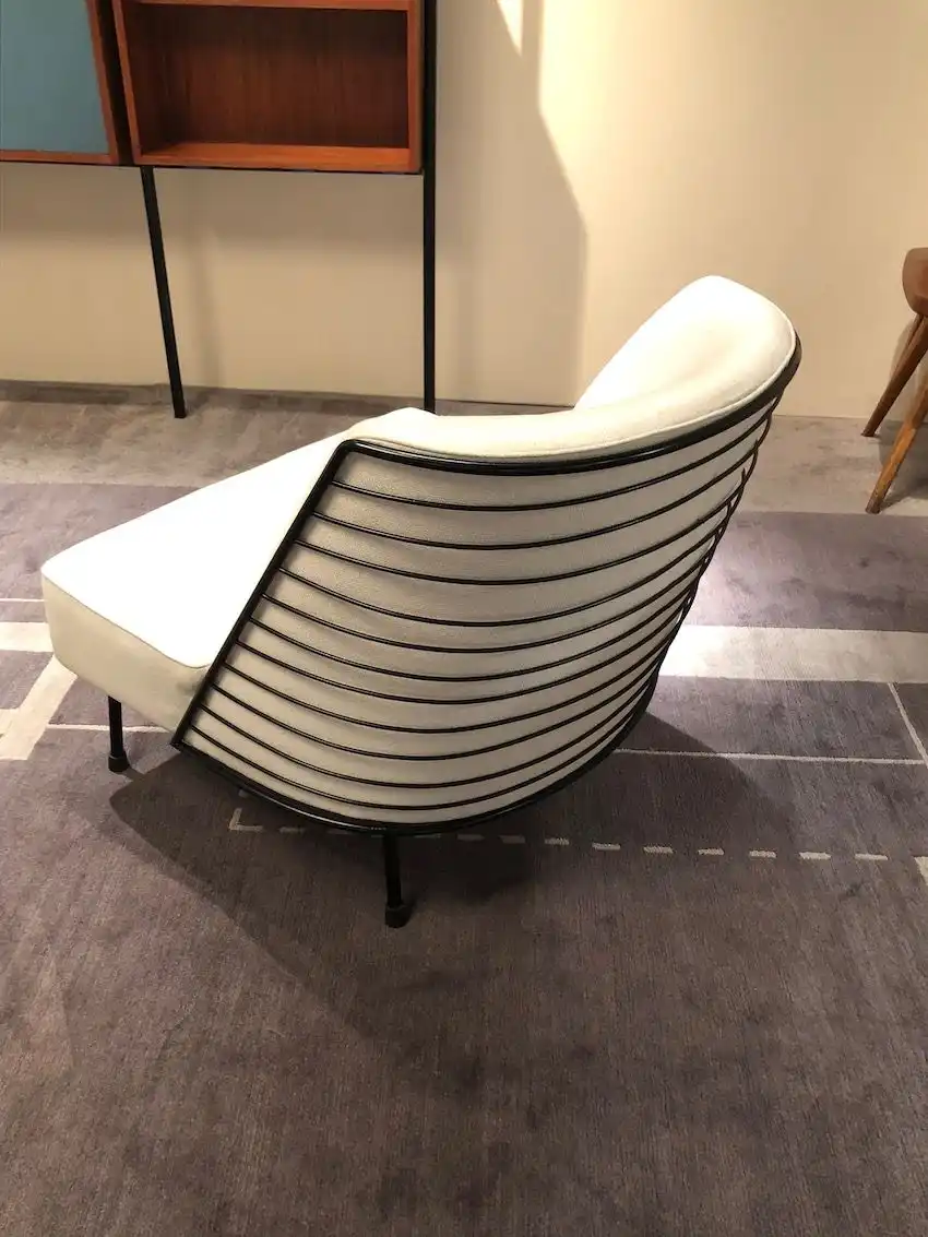 The back of the chair has a very different style of back.