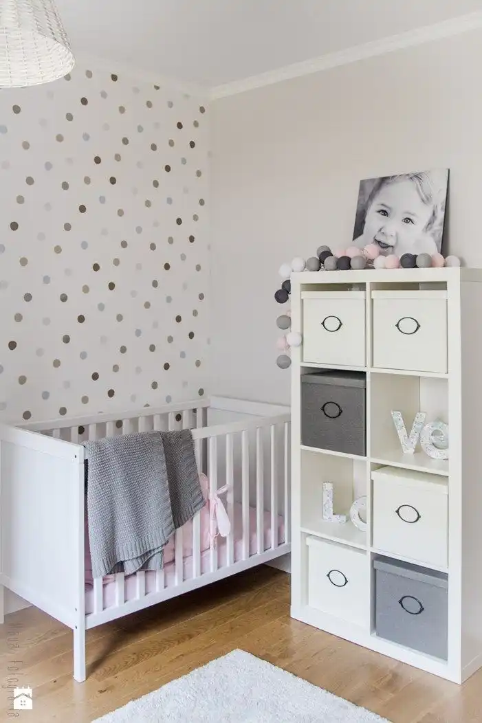 Nursery room with polka dots on wall
