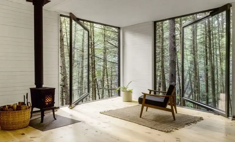 Off the grid retreat perched over a valley fireplace