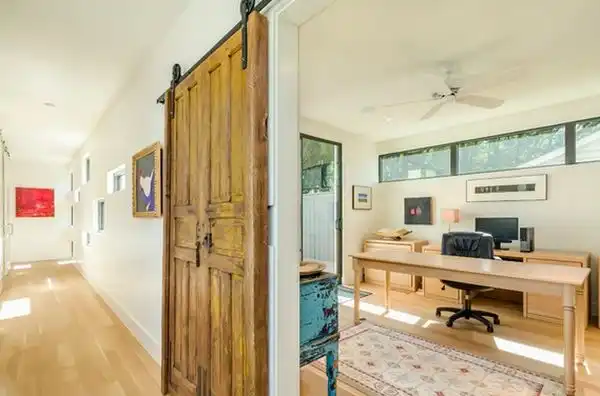Old Door Turned Into a Sliding Barn Door For Office