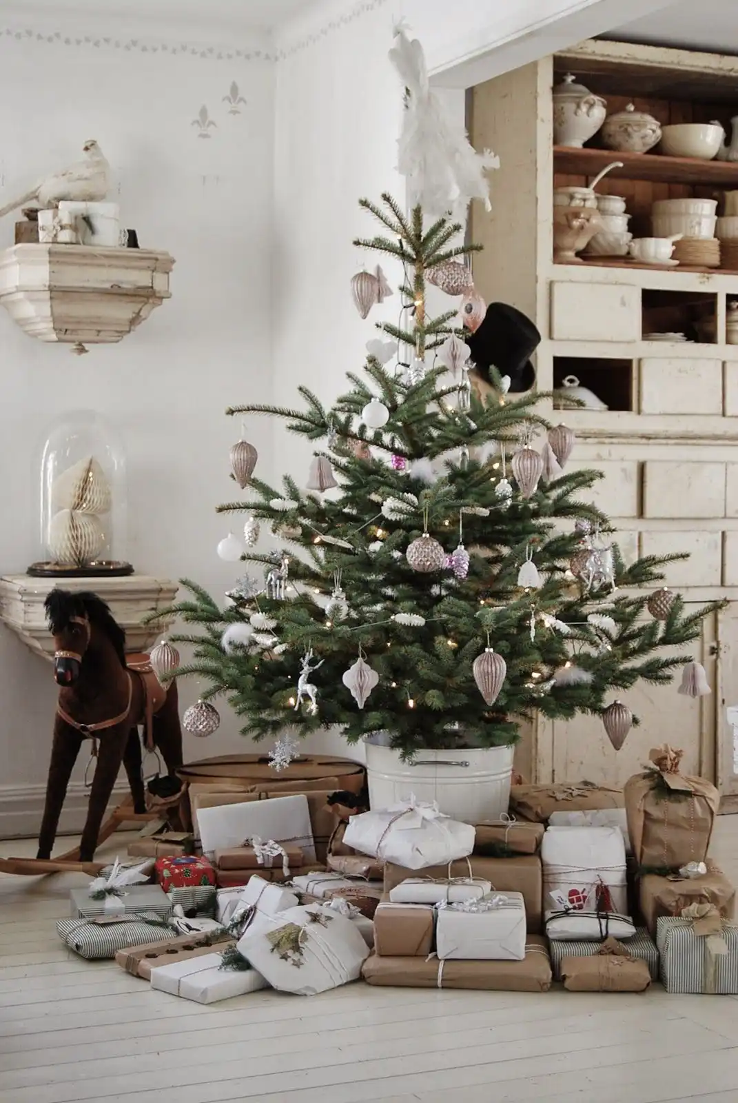 A plains and simple bucket turned into a Christmas tree container