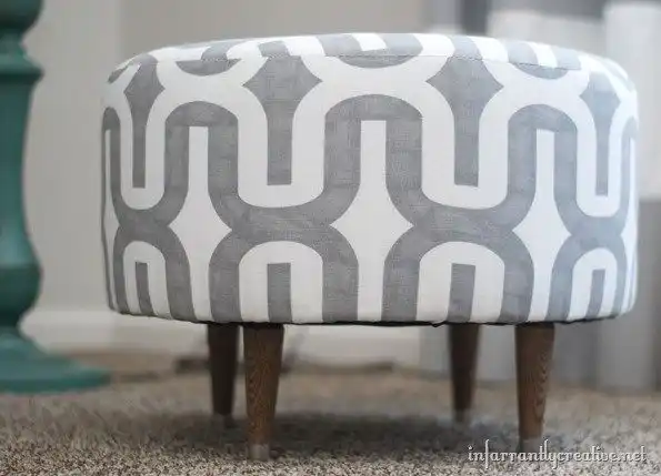Old spool ottoman