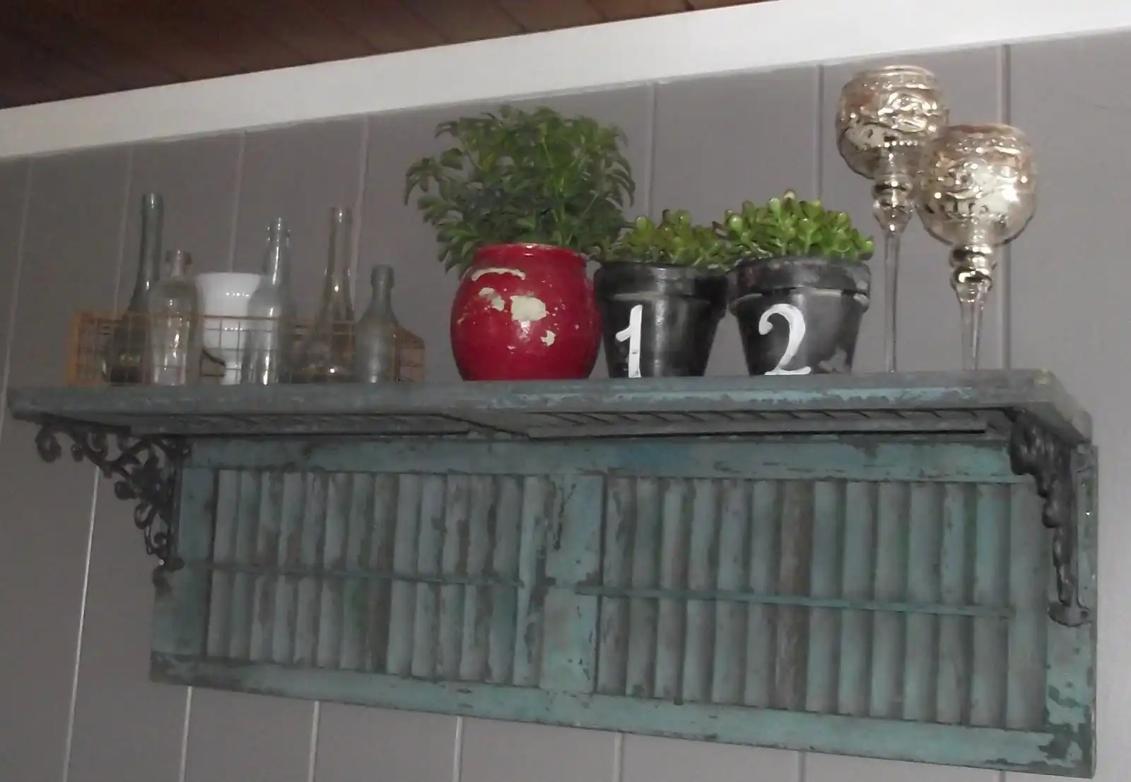 Old window shutters turned into shelves