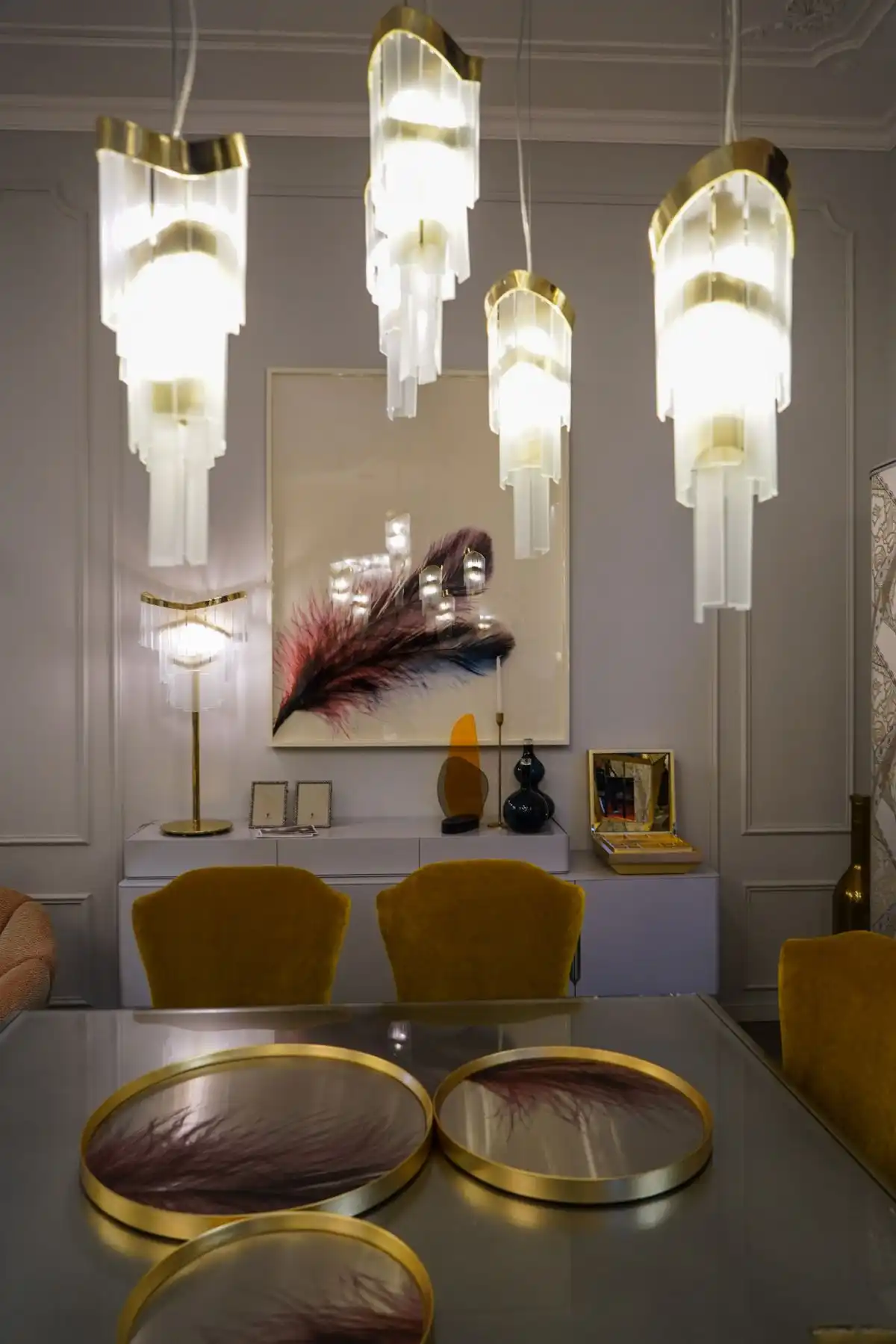 Opulent lighting fixtures above the dining table
