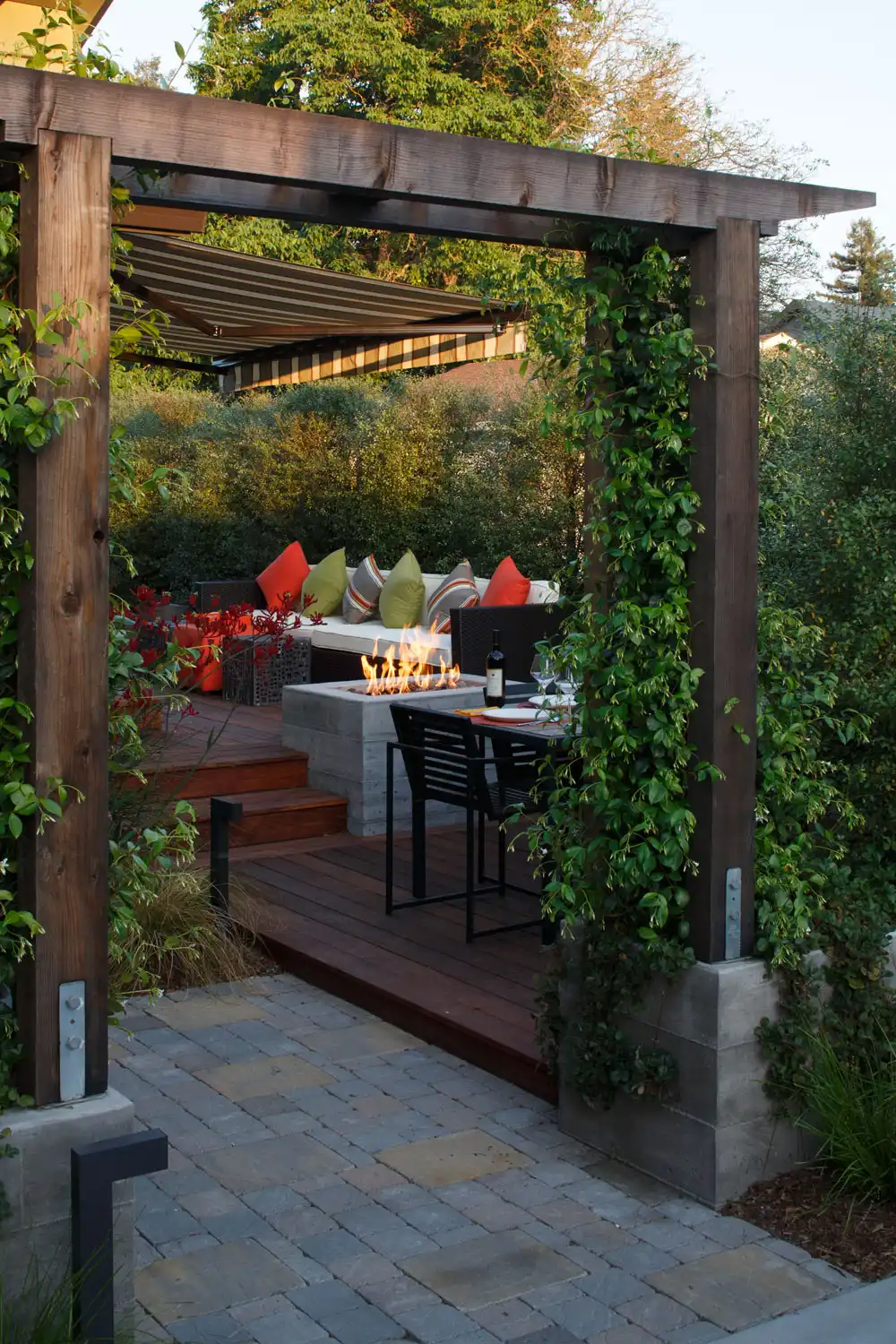 Outdoor canopy pergola with fireplace and modern furniture Healdsburg Transformation by Amy Alper