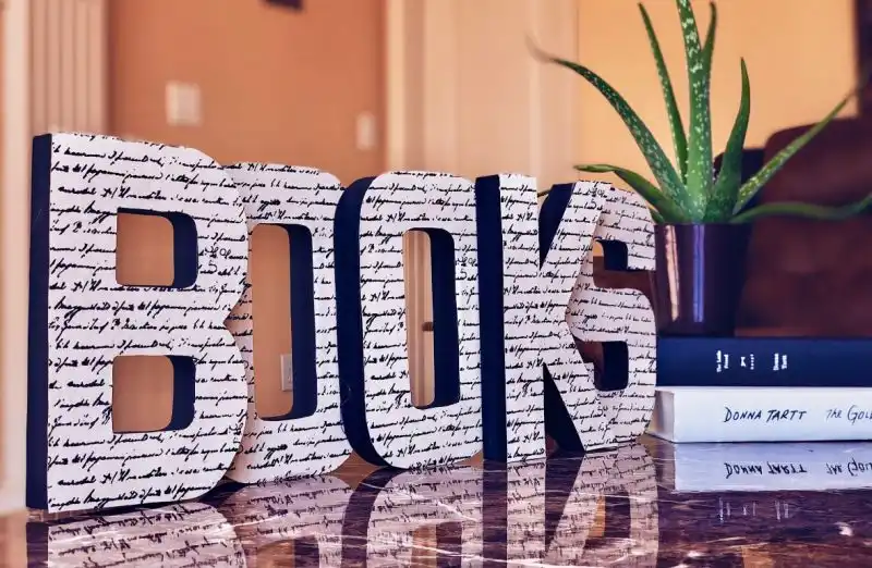 Paper mache books letters