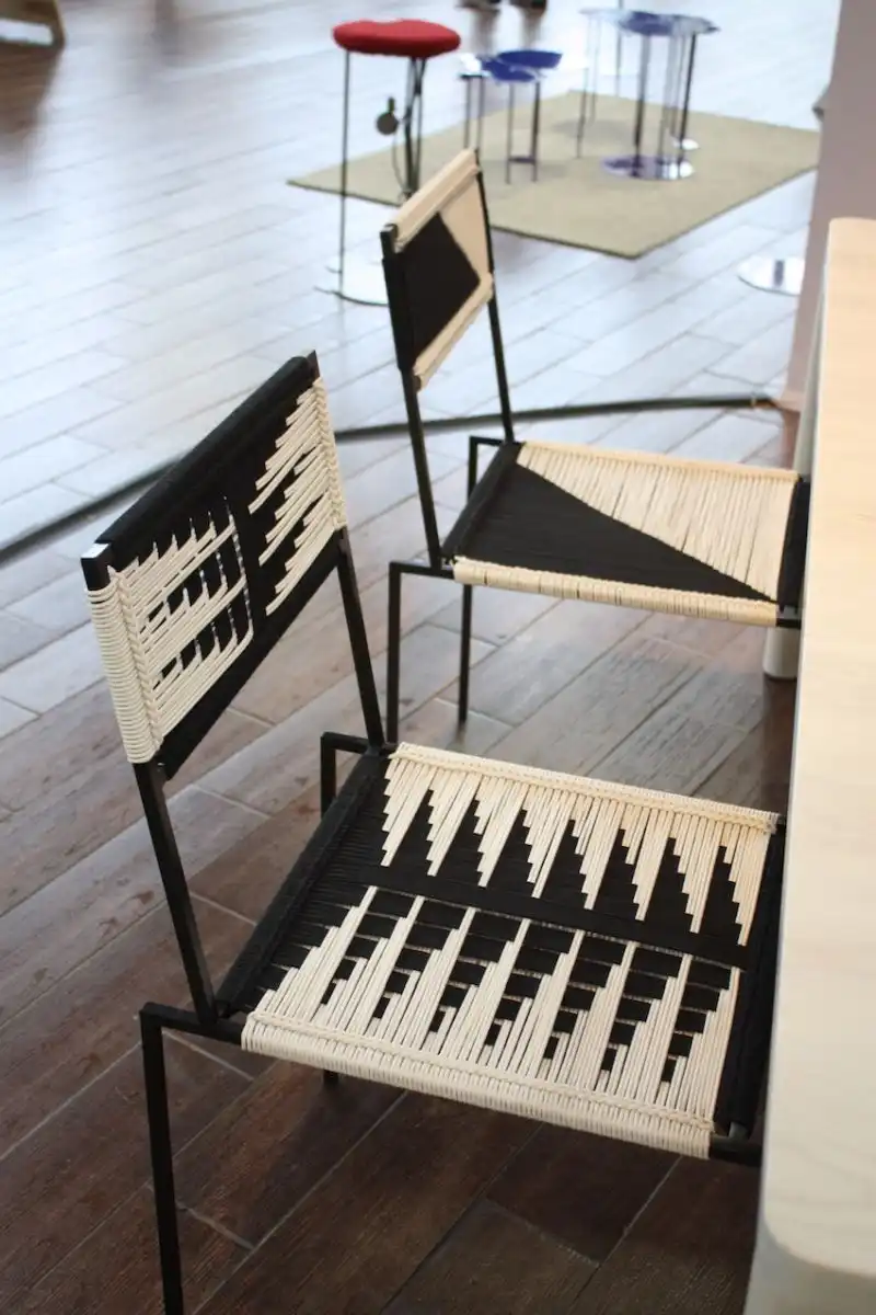 We visited with Peg Woodworking at the Architectural Digest Design Show and were happy to see her fun woven chairs at BKLYN DESIGN. Woodworker Kate Casey runs her one-woman operation making custom designed furniture. She uses elements of hand made joinery, Danish cord weaving, crochet, macrame and shaker techniques.
