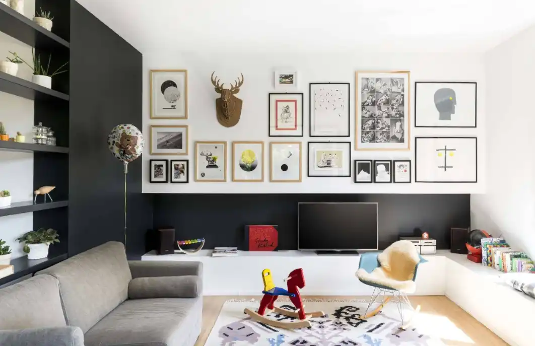 Picture frame collection and black wall