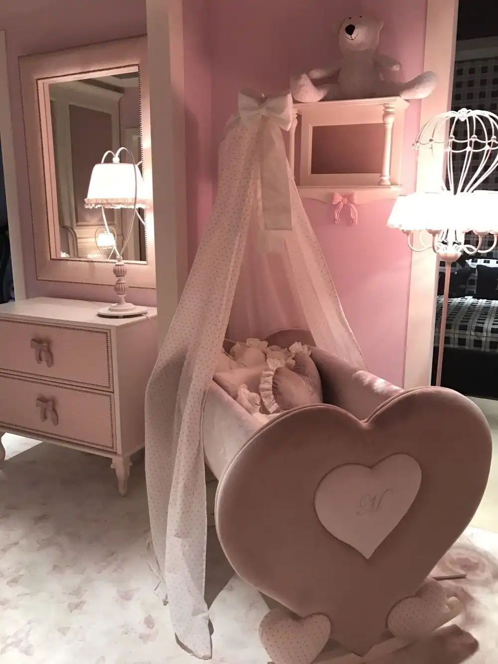 Bassinets and rocking chairs are two very cozy accent pieces for any nursery room