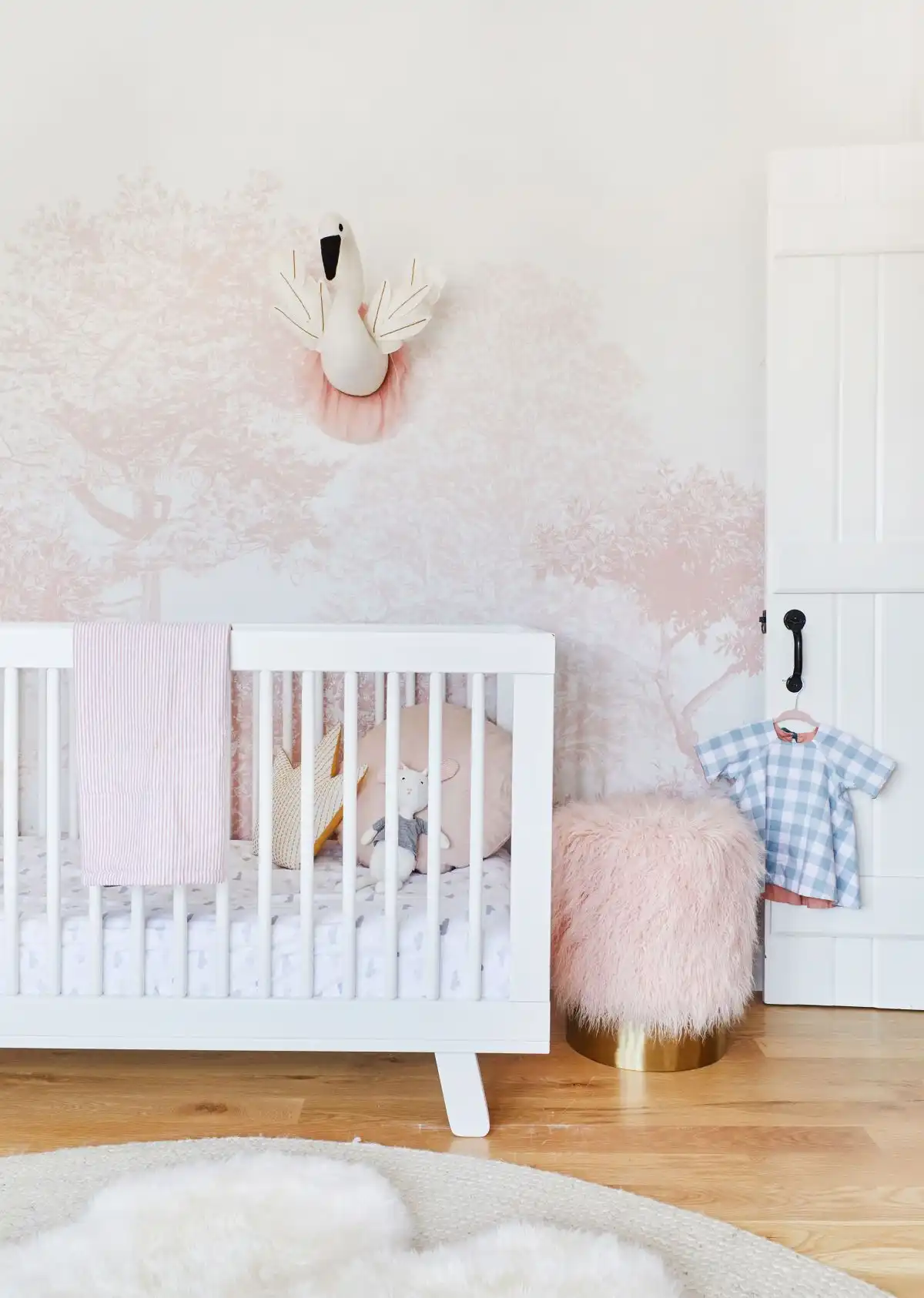 Pink girls nursery room wallpaper
