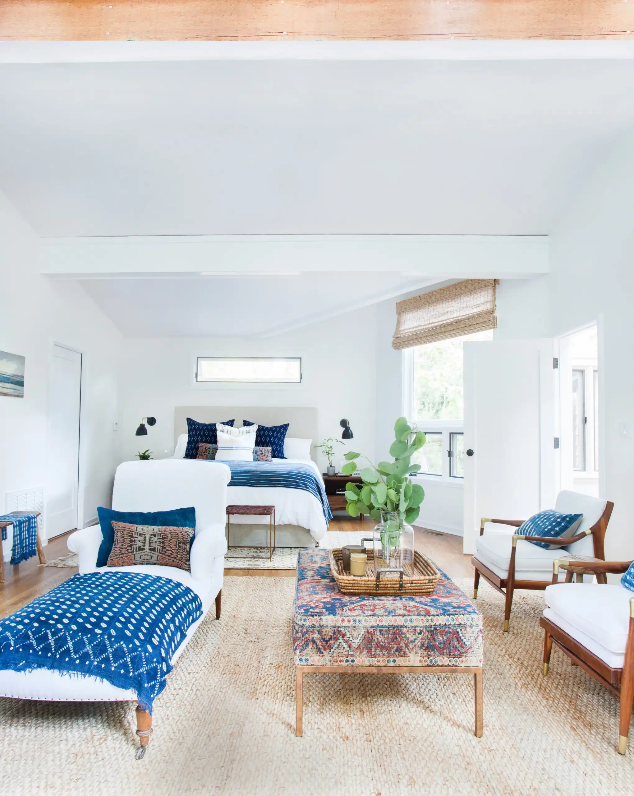 Place Different Rugs Underneath Various Pieces of Furniture scaled