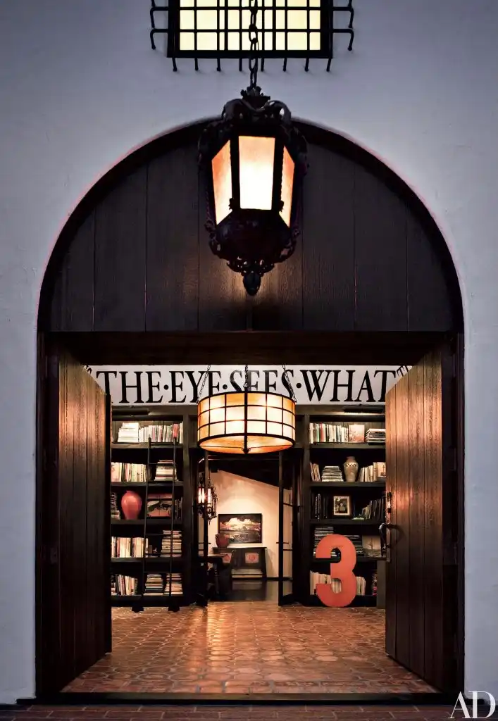 home library 63. Place a Quote Over Your Bookshelves for Inspiration