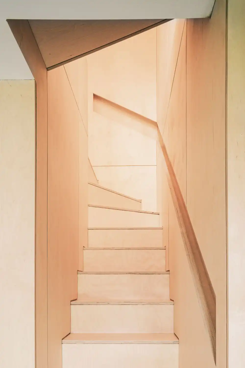 Plywood staircase wall handrail