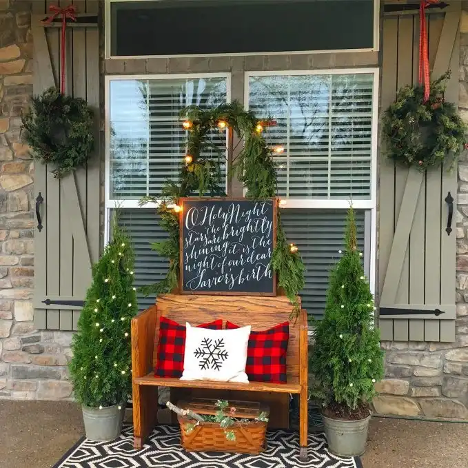 Porch decor with bench and little trees